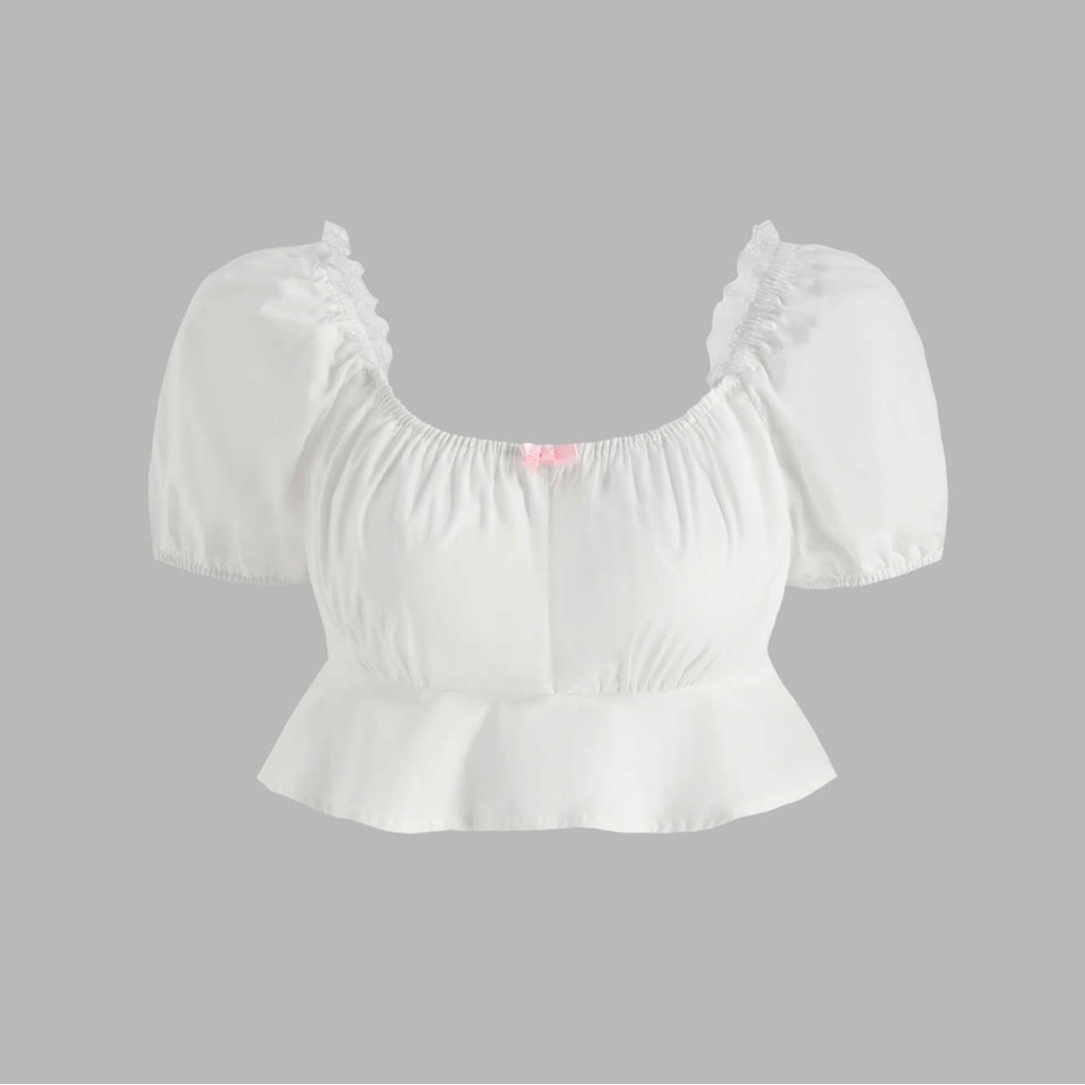 white blouse with a pink bow from cider